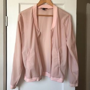Light pink zippered jacket